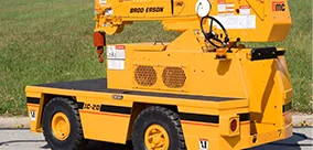 Three-quarter rear view highlighting the Broderson IC-20 carry deck crane.