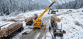 Cold weather lifting made manageable with a Broderson crane build for tough sites.