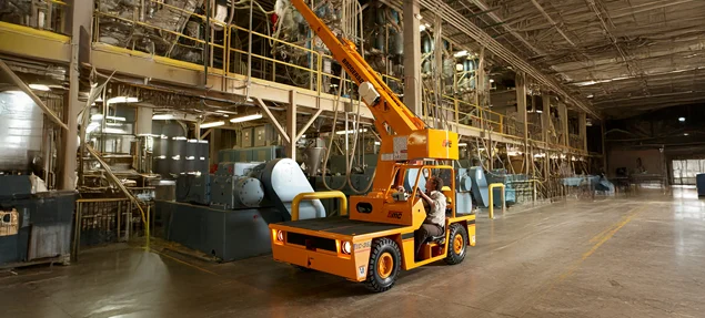 Broderson carry deck crane working indoors for plant maintenance and tight-access lifts.