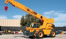 A Broderson RT-400 Crane is shown at an angle with its boom raised
