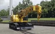 Maeda CC1908S-1 crawler crane operating outdoors with articulated boom and crawler tracks