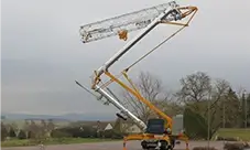 Potain Hup M 28-22 A self-erecting crane raising into position during on-site setup.