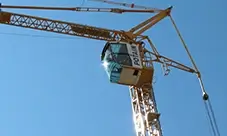 The Potain Igo T 99 puts the operator in a clear, high view for precise lifts.