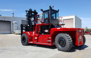 Taylor X925 Heavy Duty Forklift operating on jobsite lifting steel beams