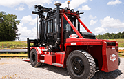 Taylor XH360L Heavy Duty Forklift back left side view operating on jobsite