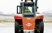 Taylor XH550M Heavy Duty Forklift back profile operating on jobsite